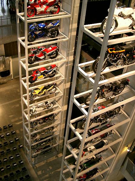 CIMG2382.JPG - Tower of motorcycles beside elevator