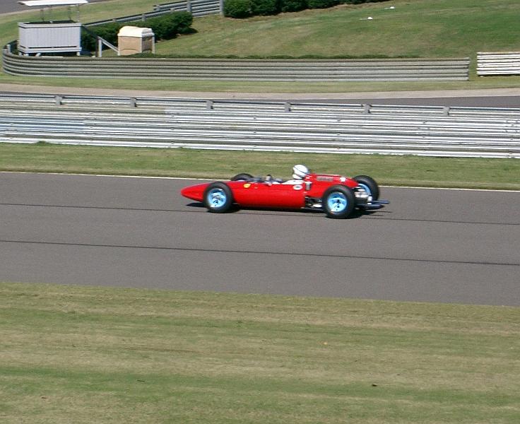 CIMG2470.JPG - John Surtees driving his wining 1964 158 Ferrari F1 car