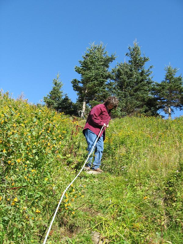 124.JPG - Marilyn taking the trail to the beach